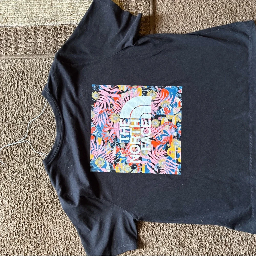 The North Face Black Tee with Yellow-Green Gradient Logo and Red Floral Accent - Picture 2 of 3
